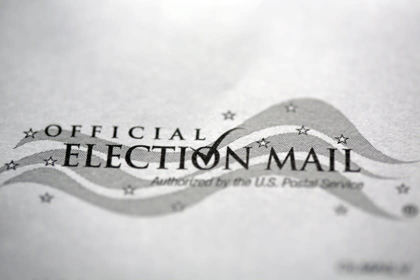 A mail-in official ballot return envelop for the 2020 General Election in the United States is shown Monday, Oct. 12, 2020 in Havertown, Pa. (AP Photo/Jacqueline Larma)