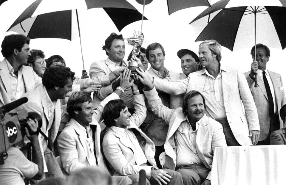 The U.S. team celebrates its 1983 Ryder Cup win in Palm Beach Gardens, Fla. The players include from center-left top, Ray Floyd, Curtis Strange and Lanny Wadkins, with captain Jack Nicklaus.