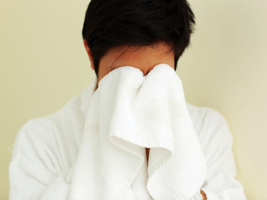 drying face with cloth