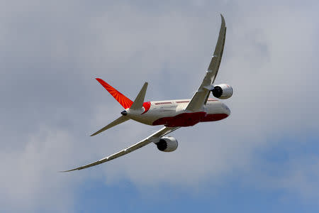 An Air India Airlines Boeing 787 dreamliner takes part in a flying display during the 50th Paris Air Show at the Le Bourget airport near Paris, June 14, 2013. REUTERS/Pascal Rossignol/Files