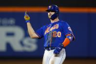 New York Mets' Pete Alonso (20) celebrates after hitting an RBI-double during the fifth inning of a baseball game against the Seattle Mariners Saturday, May 14, 2022, in New York. (AP Photo/Frank Franklin II)