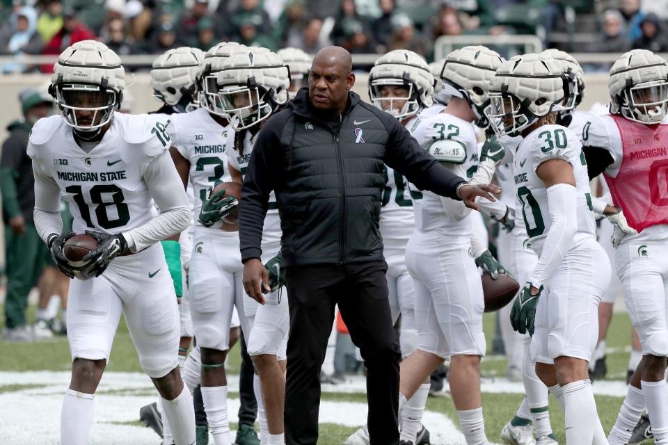 Michigan State coach Mel Tucker watches his team go through drills during the spring practice on Saturday, April 16, 2022, at Spartan Stadium.