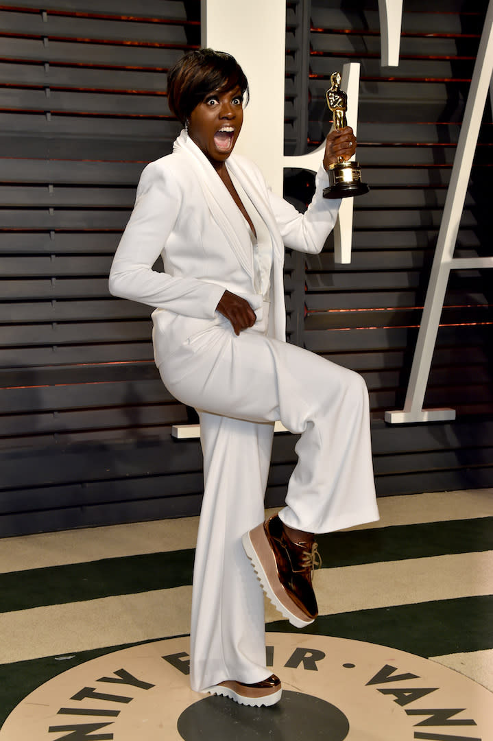 Renowned for her love of rainbow hues, Viola Davis has become one of the industry's best dressed stars. But we love her for sometimes ditching tradition and at the 2017 Oscars after-party, she stepped out in a pair of platform Stella McCartney brogues - the perfect touch to her Brandon Maxwell suit. [Photo: Getty]