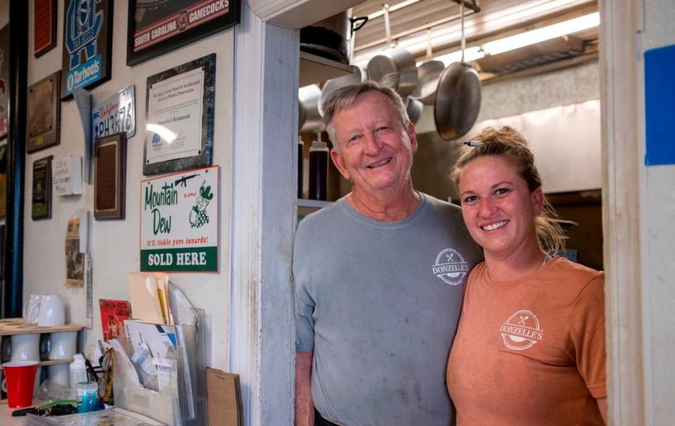 Larry Dickerson with his daughter Marley Crotts, co-owners of Donzelle’s Restaurant in Conway, S.C. January 25, 2023.