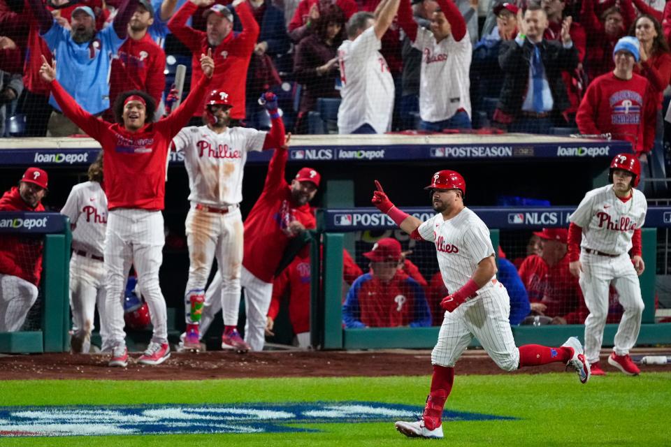 Philadelphia Phillies' Kyle Schwarber celebrates after a home run against the Arizona Diamondbacks during the sixth inning in Game 2 of the baseball NL Championship Series in Philadelphia, Tuesday, Oct. 17, 2023.