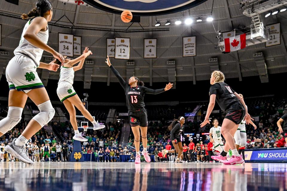 Feb 16, 2023; South Bend, Indiana, USA; Notre Dame Fighting Irish guard Olivia Miles (5) shoots the game winning basket to defeat the Louisville Cardinals 78-76 in overtime. Mandatory Credit: Matt Cashore-USA TODAY Sports