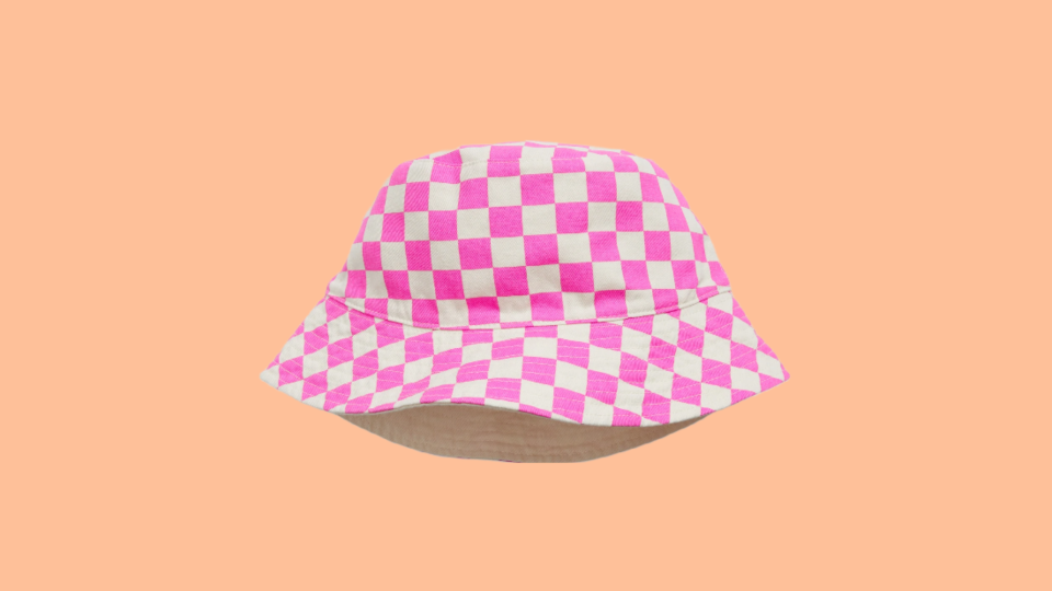 Top off your all-pink look with a Barbie-inspired bucket hat.