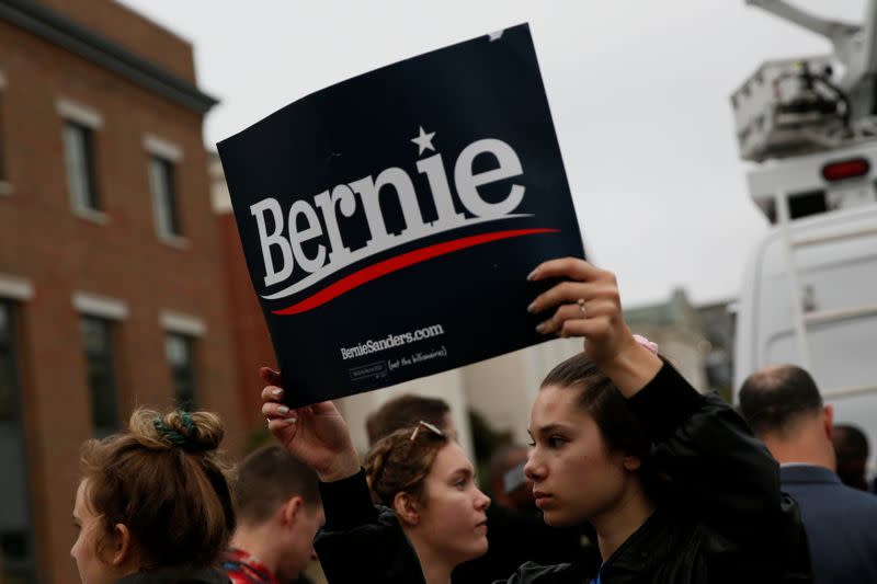 People rally outside the tenth Democratic 2020 presidential debate at the Gaillard Center in Charleston