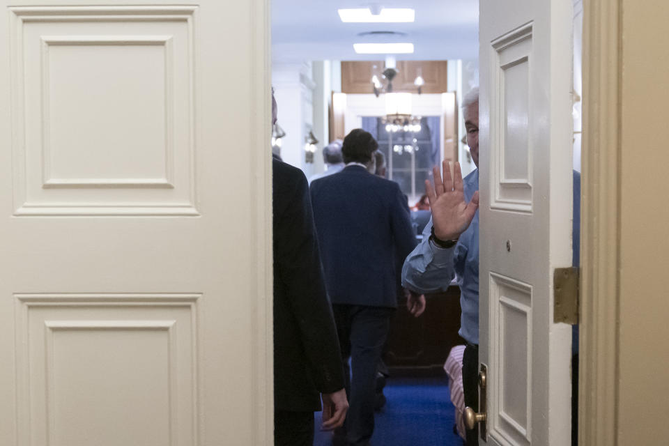 FILE - Rep. Tom Emmer, R-Minn., waves as members go behind closed doors to negotiate after Rep. Kevin McCarthy, R-Calif., was not elected as Speaker of the House at the U.S. Capitol, Jan. 3, 2023, in Washington. (AP Photo/Alex Brandon, File)