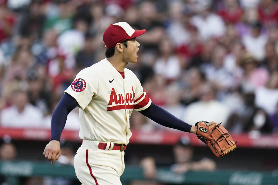 Los Angeles Angels starting pitcher Shohei Ohtani reacts after striking out Chicago White Sox's Luis Robert during the first inning of a baseball game Wednesday, June 29, 2022, in Anaheim, Calif. (AP Photo/Jae C. Hong)