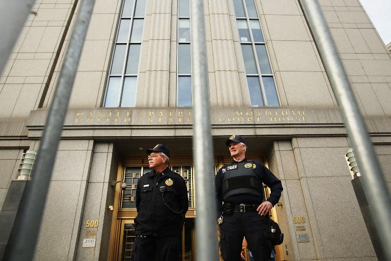 Security officers stand outside of the U.S. Federal Court House on the morning the court begins jury selection for the Abu Hamza terrorism trial on April 14, 2014 in New York City