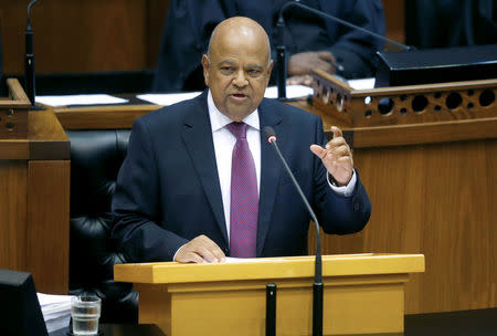 FILE PHOTO: Finance Minister Pravin Gordhan delivers his 2017 Budget Speech to Parliament in Cape Town, South Africa, February 22, 2017. REUTERS/Mike Hutchings/File Photo