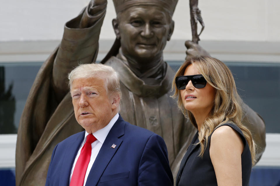 President Donald Trump and first lady Melania Trump visit Saint John Paul II National Shrine, Tuesday, June 2, 2020, in Washington. (AP Photo/Patrick Semansky)