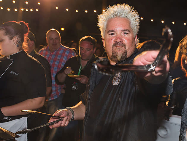 When Guy Fieri tongs, people listen. (Getty Images)