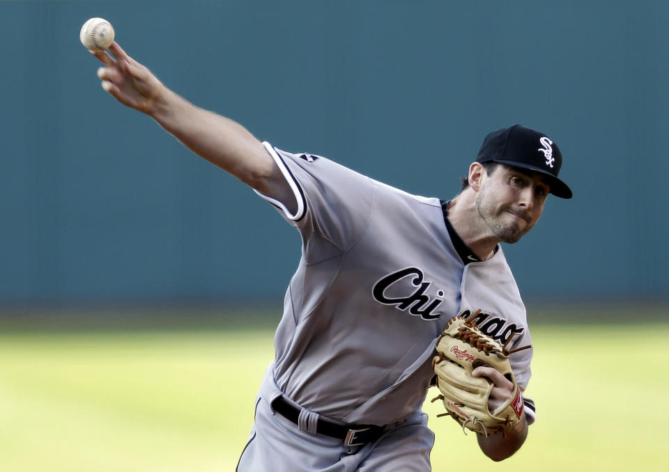 Chicago White Sox starting pitcher Scott Carroll delivers in the first inning of a baseball game against the Cleveland Indians, Saturday, May 3, 2014, in Cleveland. (AP Photo/Tony Dejak)