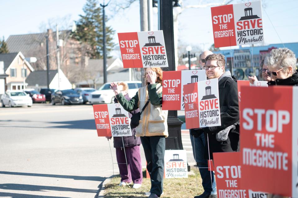 Protesters gather outside of Marshall City Hall in downtown Marshall to oppose development of the Marshall Megasite on Monday, Feb. 13, 2023.