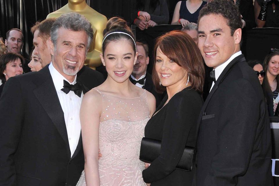 <p>PRPP/Plux/Shutterstock</p> Hailee Steinfeld with her dad Peter Steinfeld, mom Cheri Steinfeld and brother Griffin Steinfeld at The 83rd Annual Academy Awards on February 27, 2011. 