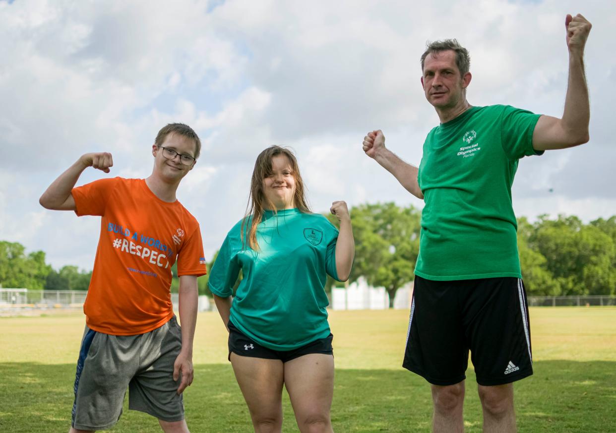 From left, Sidge Taylor, Caitlyn Williamson and Chris Yandell pose at the Susan Street Sports Complex in Leesburg on Saturday, May 7, 2022. [PAUL RYAN / CORRESPONDENT]