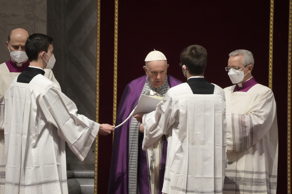 Pope Francis presides over a special prayer in St. Peter's Basilica at the Vatican, Friday, March 25, 2022. Francis is presiding over a special prayer for Ukraine that harks back to a century-old apocalyptic prophesy about peace and Russia that was sparked by purported visions of the Virgin Mary to three peasant children in Fatima, Portugal in 1917. (AP Photo/Gregorio Borgia)