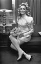 <p>Sharon Tate's wedding dress, for her London ceremony to Roman Polanski, was the height of '60s fashion. The <em>Valley of the Dolls </em>star opted for an ivory silk mioré dress with a mini hemline and high neck. </p>