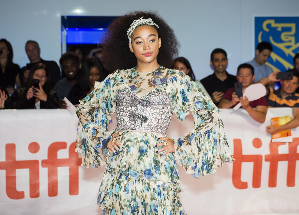 Actress Amandla Stenberg poses for photographs on the red carpet after arriving for the new movie "The Hate U Give" during the 2018 Toronto International Film Festival in Toronto on Friday, Sept. 7, 2018. (Nathan Denette/The Canadian Press via AP)