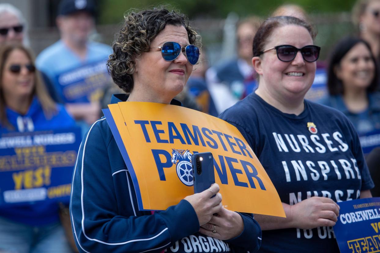 Alyson Dorken, 40, of Carleton, attends the solidarity rally for Corewell Health East registered nurses, who are banding together to unionize with the Teamsters Council 43, at the Teamsters building in Detroit on Friday, May 10, 2024. Dorken says nurses need a union because of the conditions they work under. Dorken, who works for Corewell East says, “We can’t give the patients the care they need when we are short staffed.” Rachel Georgia, 36, of Taylor, Mich., who used to work at the same hospital, attended to support the nurses of Corewell East.