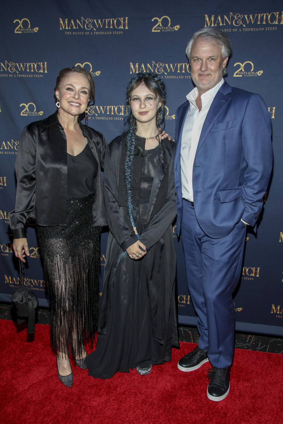 Stronach with her husband, Greg Steinbruner, and their daughter, Maya, at a screening of Man and Witch: The Dance of a Thousand Steps on July 21.