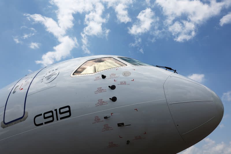 A Comac C919 plane is displayed at the Singapore Airshow at Changi Exhibition Centre