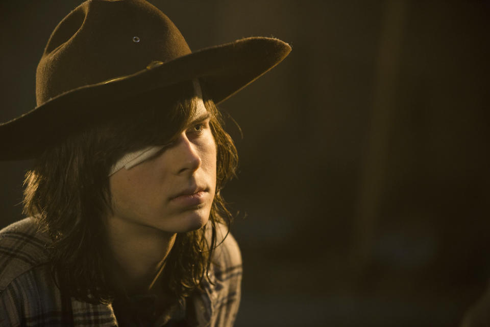 <p>Chandler Riggs as Carl Grimes (Credit: Gene Page/AMC) </p>