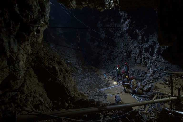 Miners work inside a ruby mine in Mogok, Myanmar