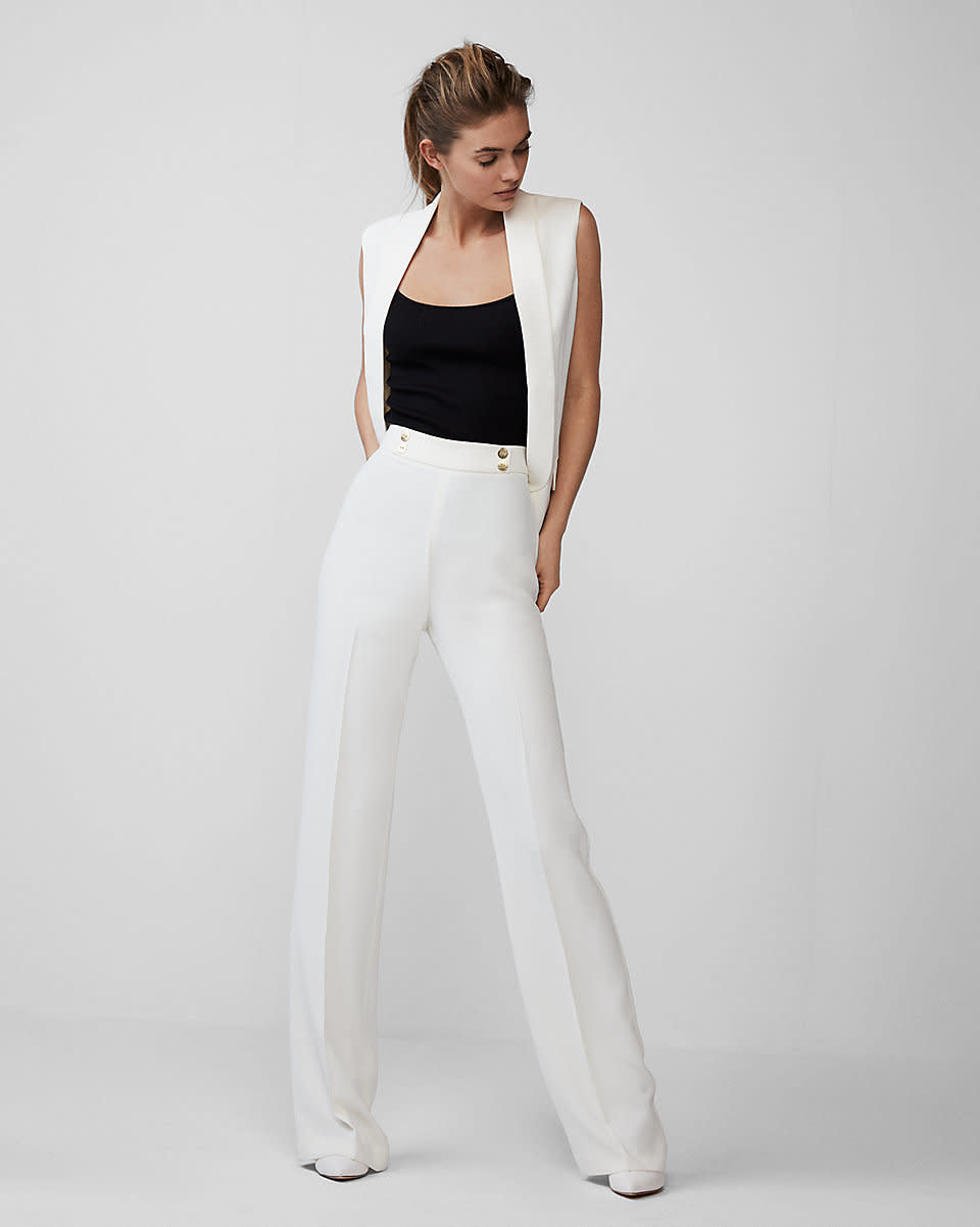 Get it at <a href="https://www.express.com/clothing/women/extreme-high-waisted-drape-wide-leg-dress-pant/pro/07439632/color/SOFT%20IVORY?mrkgcl=638&amp;mrkgadid=3276578789&amp;rkg_id=h-3fefc698f67eb1d5fa9587121bab3bf5_t-1520957583&amp;CID=SEM_Goo-PLA-F-Qualified-Retail-92-000-Dress_Pants-US-Product-NA&amp;SearchID=Goo-PLA-F-Qualified-Retail-92-000-Dress_Pants-US-Product-NA&amp;product_id=13052614&amp;adpos=1o4&amp;creative=230497550586&amp;device=c&amp;matchtype=&amp;network=g&amp;gclid=Cj0KCQjw7Z3VBRC-ARIsAEQifZQs0LCxWFHAIiiZHDXn5xxw2Dn0HFjX06FOD8YnaikqQlsild-jbgcaAtKyEALw_wcB" target="_blank">Express</a>, $70.