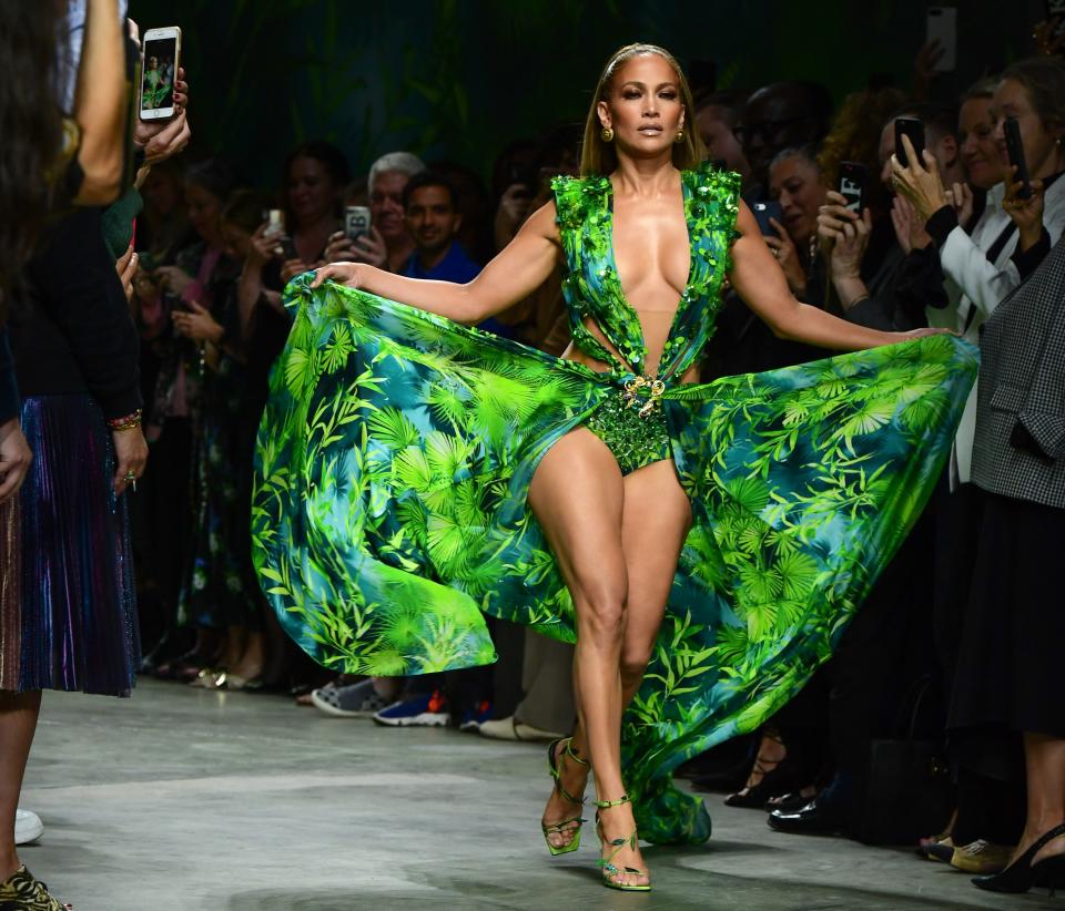 US singer Jennifer Lopez presents a creation for Versace's Women's Spring Summer 2020 collection in Milan on September 20, 2019. (Photo by Miguel MEDINA / AFP)        (Photo credit should read MIGUEL MEDINA/AFP/Getty Images)