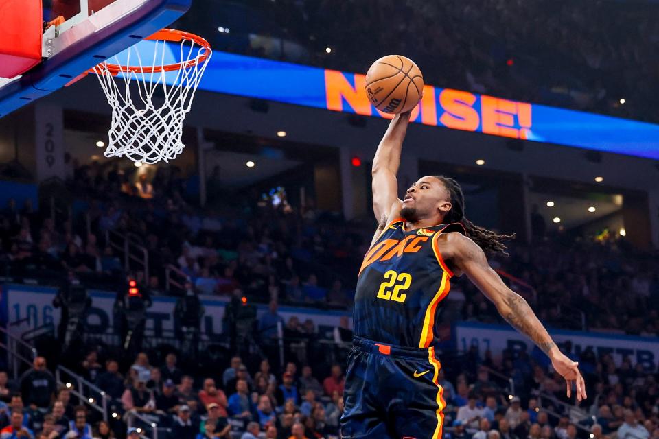 Oklahoma City guard Cason Wallace (22) dunks the ball in the second quarter during an NBA game between the Oklahoma City Thunder and the San Antonio Spurs at the Paycom Center in Oklahoma City, on Tuesday, Nov. 14, 2023.