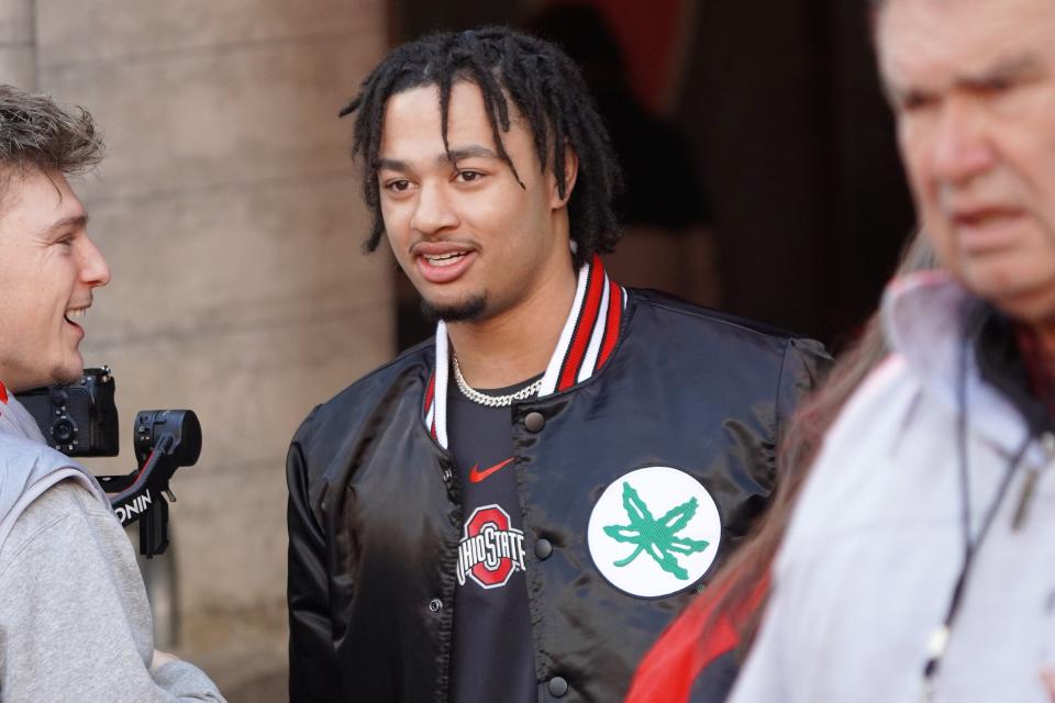 Ohio State wide receiver Jaxon Smith-Njigba, who has been out most of the season, again sat out when the Buckeyes' lost 45-23 to Michigan.