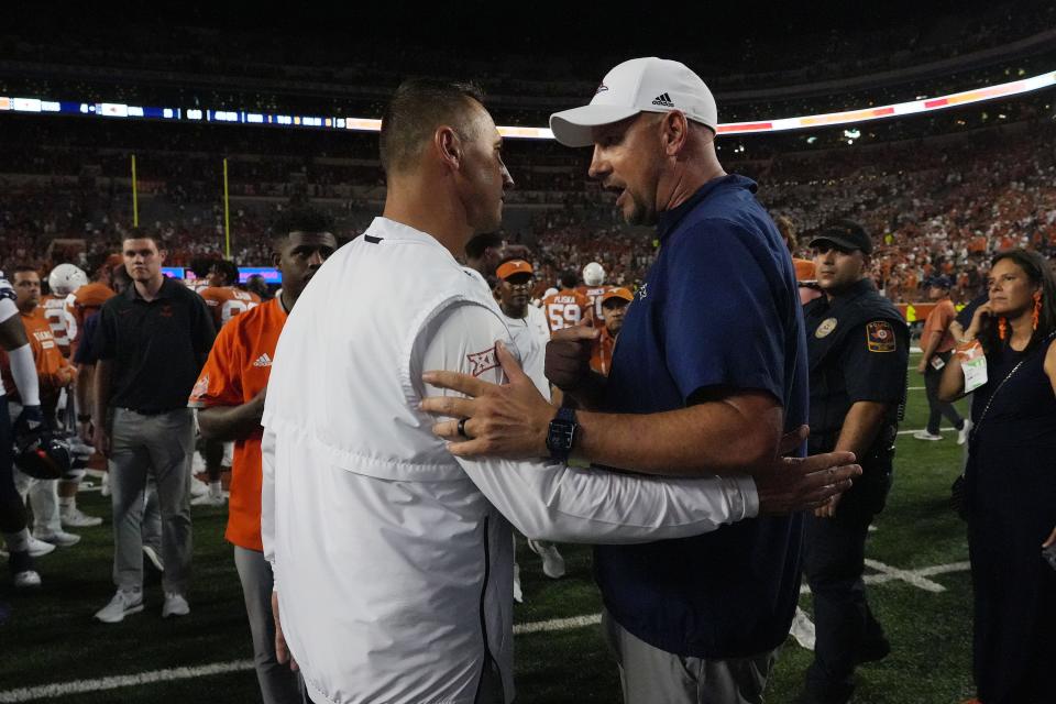 UT head coach Steve Sarkisian and UTSA head coach Jeff Traylor shake hands after the game Saturday, Sept. 17, 2022, at the Darrell K Royal Memorial Stadium in Austin. UT won 41-20 against UTSA.