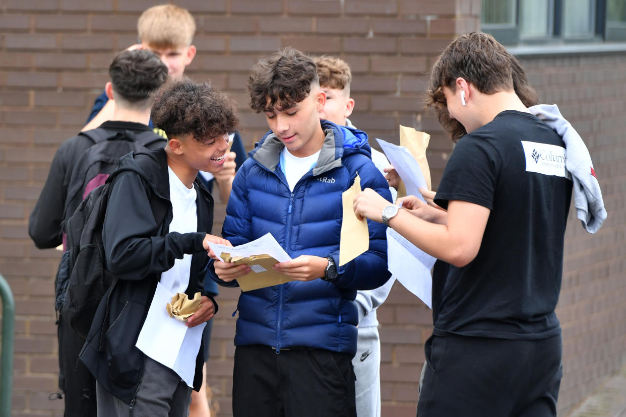 HYDE, ENGLAND - AUGUST 25: Students receive their GCSE results at Longdendale High School on August 25, 2022 in Hyde, Greater Manchester, England. This year's candidates are the first to sit exams since 2019 due to the Covid-19 pandemic and the results will likely reflect the impact of the pandemic on the nation's schoolchildren. (Photo by Anthony Devlin/Getty Images)