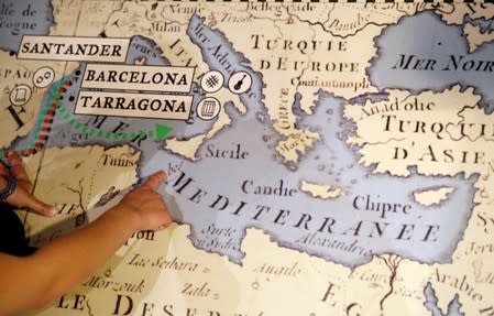 German captain of Sea Watch 3 Carola Rackete points to a map during an interview at Maritime Museum of Barcelona