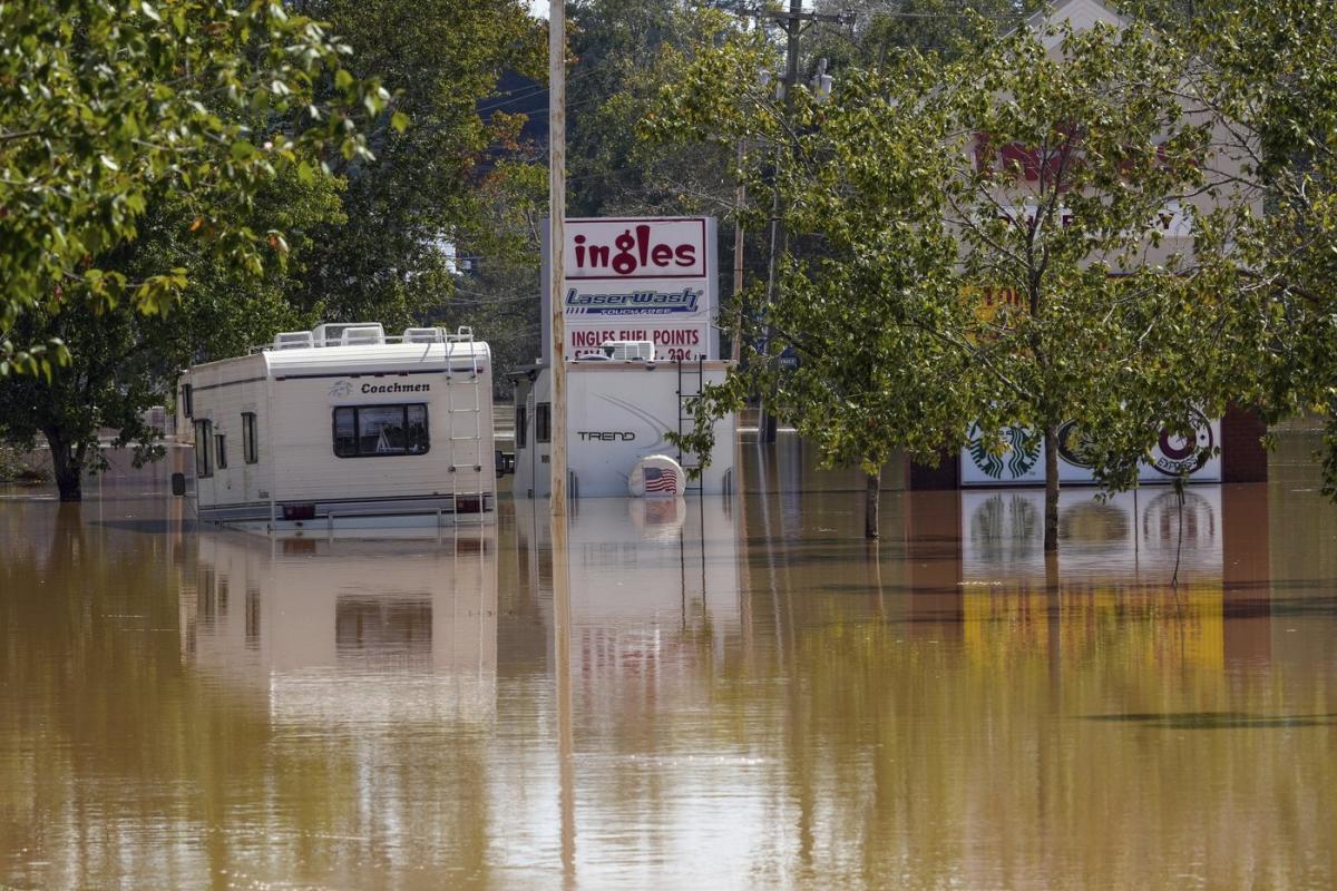 The Latest: Helene’s death toll rises to nearly 100 as supplies rushed to isolated communities