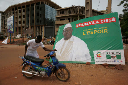 An electoral billboard of Soumaila Cisse, leader of URD (Union for the Republic and Democracy), an opposition party, is pictured in Bamako, Mali July 27, 2018. REUTERS/Luc Gnago