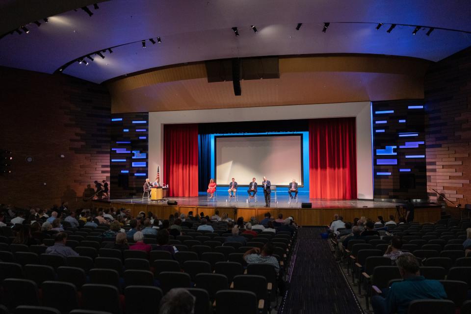 Candidates sit during the first Congressional District 2 debate at Woods Cross High School in Woods Cross on June 20, 2023. | Ryan Sun, Deseret News