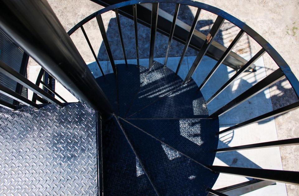 A spiral staircase allows visitors to climb to the top of the belt buckle and appear as if they are wearing it.