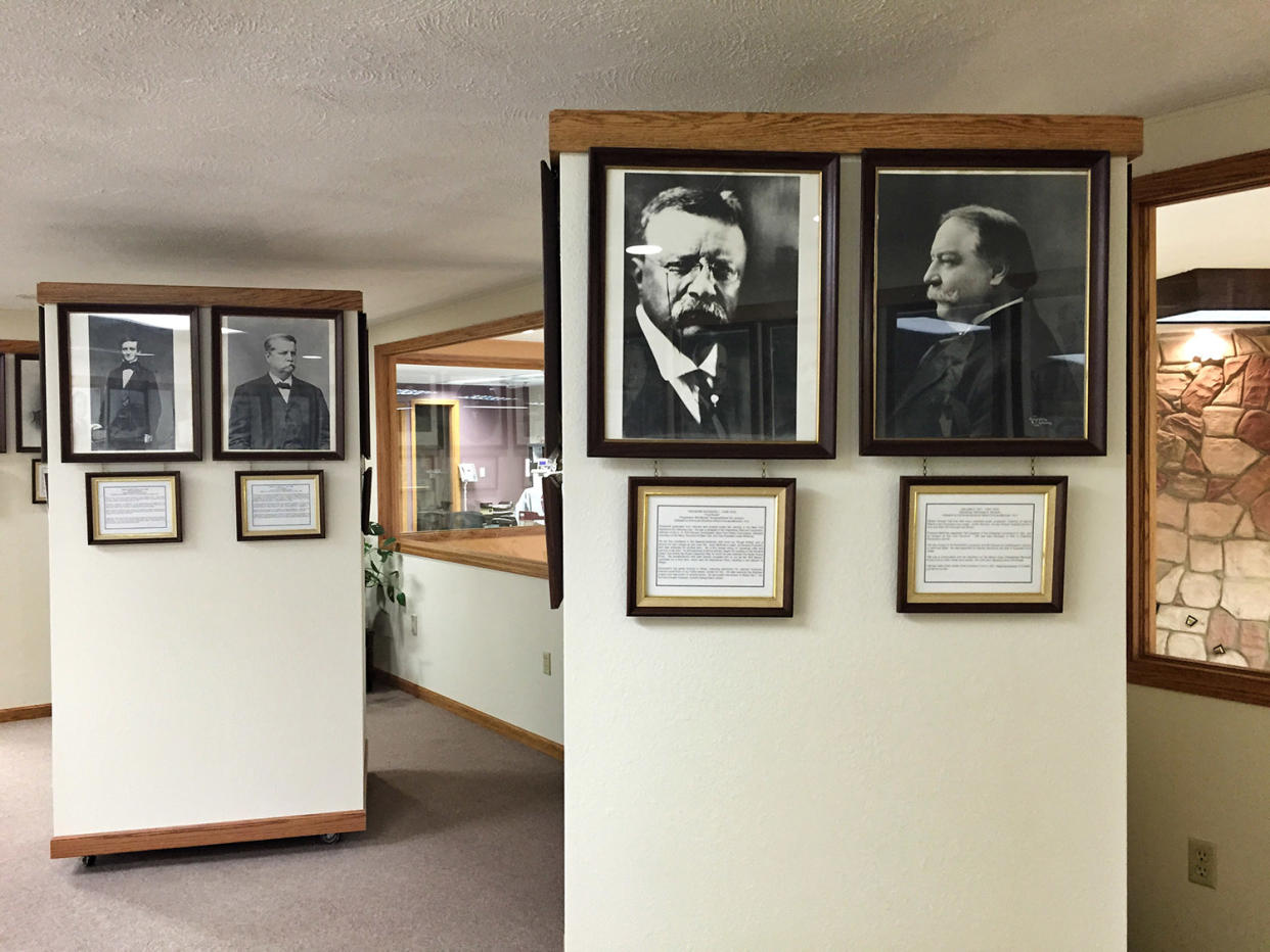 Framed photos of also-rans in the Presidential Losers Museum.