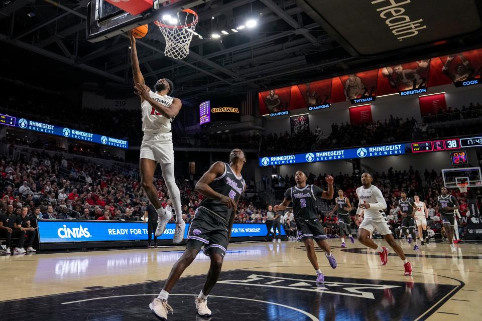 Cincinnati Bearcats forward John Newman III (15) led UC with 18 points in their 74-72 win over Kansas State Saturday.