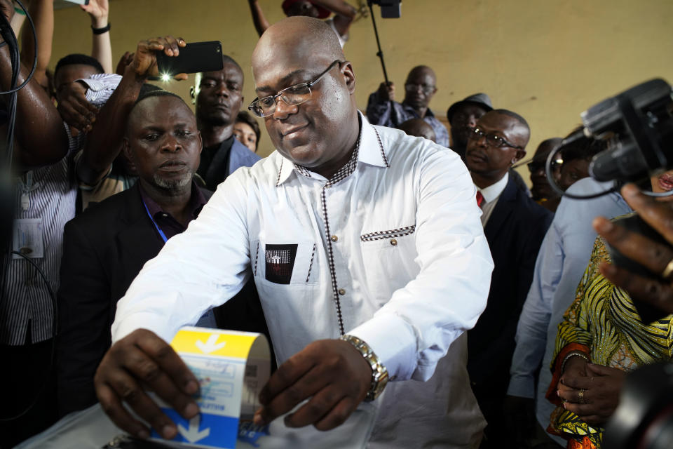 Opposition presidential candidate Felix Tshisekedi casts his ballot in Kinshasa Sunday Dec. 30, 2018. Forty million voters are registered for a presidential race plagued by years of delay and persistent rumours of lack of preparation. (AP Photo/Jerome Delay)