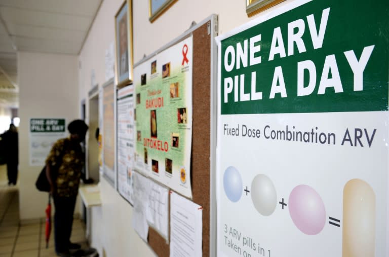 A woman queueing to receive pills that help HIV-positive people from developing AIDS at a clinic north of Johannesburg. South Africa has one of the largest programmes to distribute the life-saving drugs. at the Pharmacy at Phedisong clinic on April 8, 2013 during the launch of the new single dose anti-AIDs drug in Ga-Rankuwa,100 kms north of Johannesburg. The new pill will simplify the world's biggest HIV treatment regime to just one life-saving pill a day. The new single dose AIDS drug was secured at a record-low price and will cost the state 89 rand a month ($10, eight euros) per patient. After years of refusing to roll out ARVs, South Africa now has 1.9 million people on treatment of its 5.6 million HIV-positive population, which is the world's largest. The new pill will be introduced this month to positive pregnant women and breastfeeding mothers, people co-infected with TB, and to new ARV patients. AFP PHOTO / STEPHANE DE SAKUTINA woman queues at the Pharmacy at Phedisong clinic on April 8, 2013 during the launch of the new single dose anti-AIDs drug in Ga-Rankuwa,100 kms north of Johannesburg. The new pill will simplify the world's biggest HIV treatment regime to just one life-saving pill a day. The new single dose AIDS drug was secured at a record-low price and will cost the state 89 rand a month ($10, eight euros) per patient. After years of refusing to roll out ARVs, South Africa now has 1.9 million people on treatment of its 5.6 million HIV-positive population, which is the world's largest. The new pill will be introduced this month to positive pregnant women and breastfeeding mothers, people co-infected with TB, and to new ARV patients. AFP PHOTO / STEPHANE DE SAKUTIN