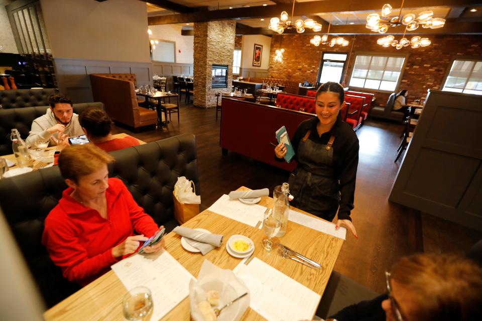 Sarah Seguin greets two women having lunch at the newly renamed Bocca Pasta Grill Bar in Fairhaven, formerly The Pasta House.