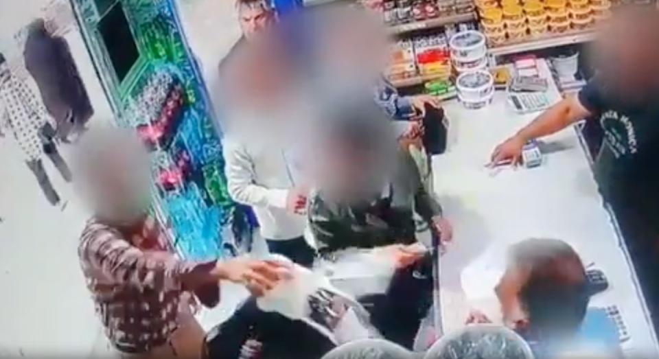 Moment man attacks women with yoghurt for not covering hair (Screengrab)