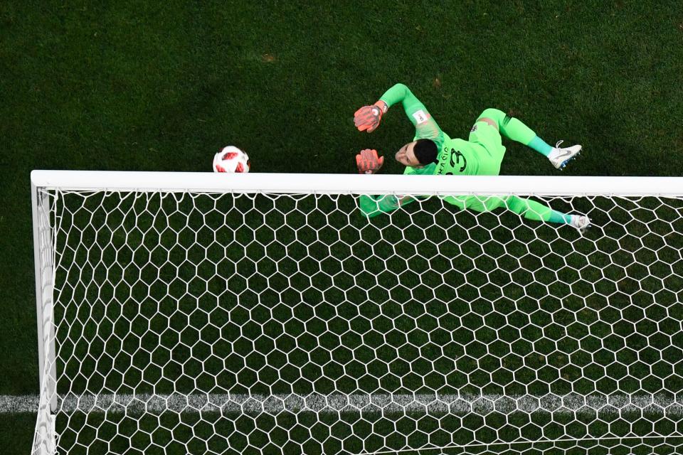 <p>Croatia’s goalkeeper Danijel Subasic concedes from a free-kick during the Russia 2018 World Cup semi-final football match between Croatia and England at the Luzhniki Stadium in Moscow on July 11, 2018. (Photo by François-Xavier MARIT / AFP) </p>
