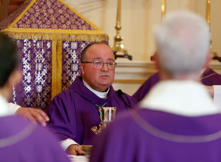 FILE PHOTO: Archbishop of Malta Charles Scicluna celebrates Mass in Malta October 23, 2017. REUTERS/Darrin Zammit Lupi/File Photo