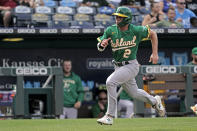 Oakland Athletics second baseman Nick Allen runs home to score on a single by Jonah Bride during the fourth inning of a baseball game against the Kansas City Royals Saturday, June 25, 2022, in Kansas City, Mo. (AP Photo/Charlie Riedel)